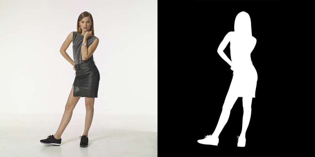 Woman posing in a studio next to her silhouette mask used for alpha channel masking