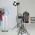 Woman styling a shirt on a headless mannequin in a photo studio