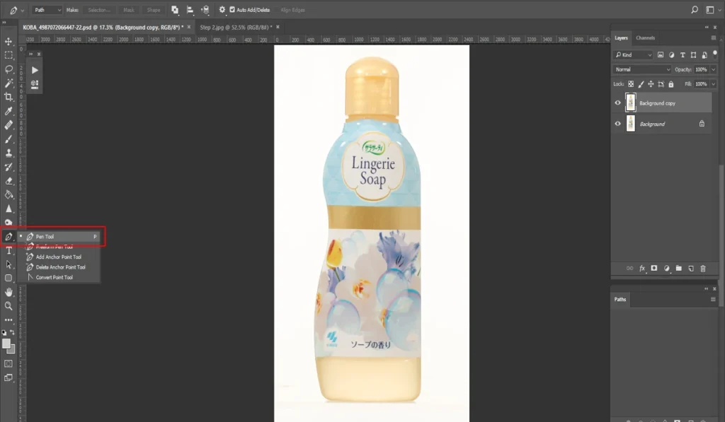 A screenshot of Adobe Photoshop shows a bottle of "Lingerie Soap" with a floral design on a white background, with the Pen Tool selected from the toolbar on the left