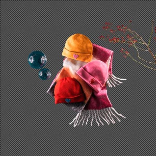 Heart-patched beanies and a striped scarf with bubbles and red berries on a transparent background.