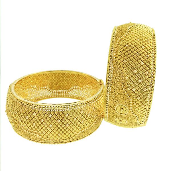 Two heavily textured gold bangles, one slightly open, are displayed against a bright white background, appearing more vivid and contrasted than before
