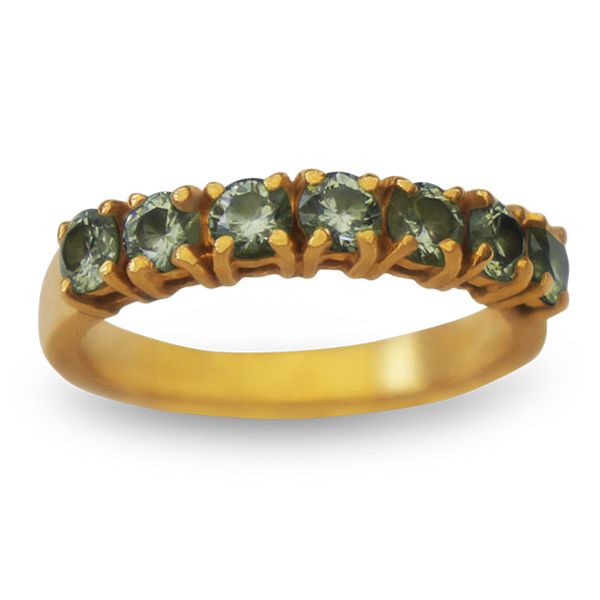 A vibrant gold ring featuring seven round, light green gemstones, on a pure white background.