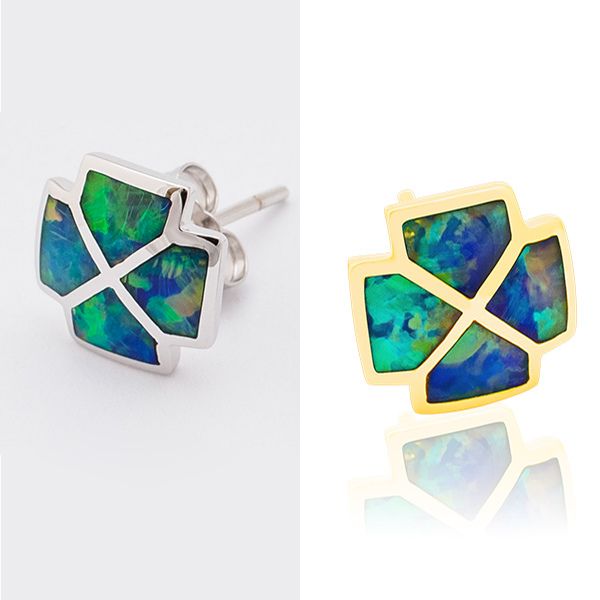 A "before and after" comparison of a cross-shaped earring. The left side shows a silver earring with green and blue opal inlay on a light grey background, while the right displays a gold version with similar inlay and a reflection on a white background