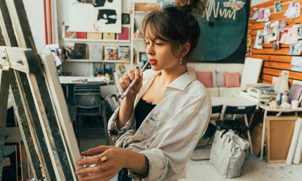 A young woman doing painting
